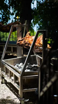 Wood-fired roasting station in the garden