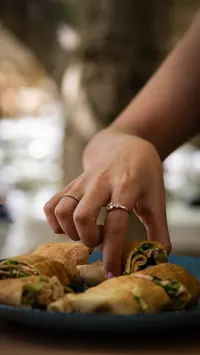 Chef arranging filled pastries